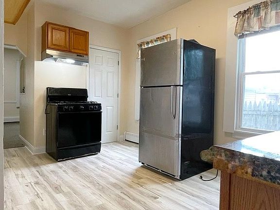 View of kitchen from the back entryway