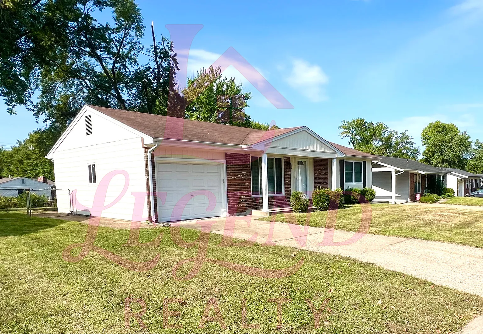 Updated 3-Bedroom Home with a 1 Car Garage & Fenced Yard in St. Charles! — Photo 2