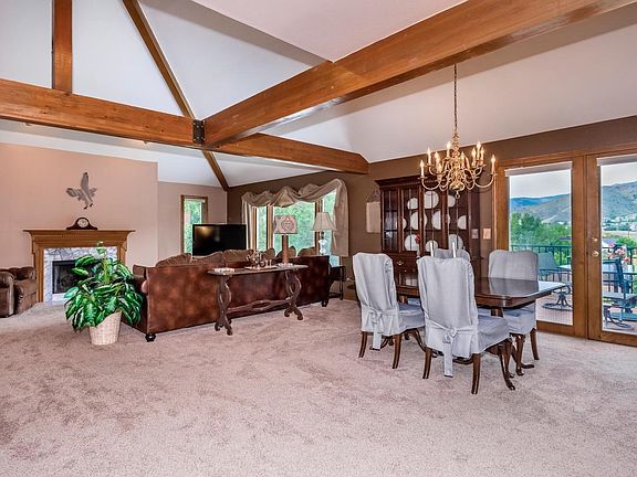 Beams, vaults & views- this is no cookie cutter home!