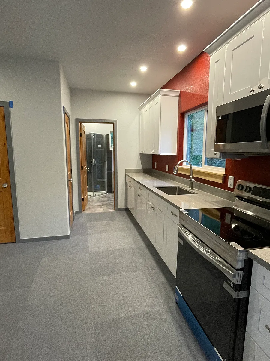 Kitchen leading to bathroom - 12570 Mays Canyon Rd