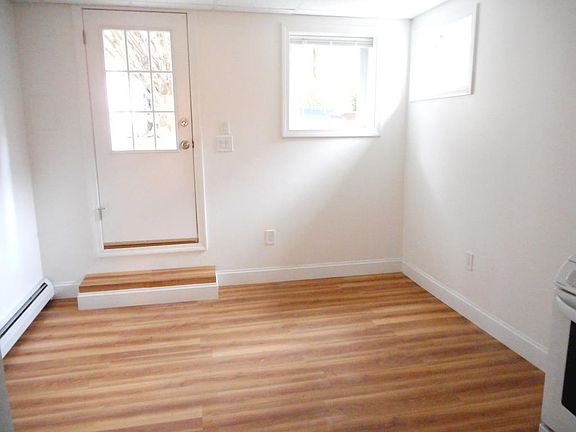living room (full-size sofa along wall at right)