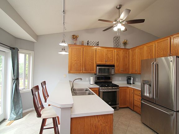 4th image of 8731 Nevada Ave N
