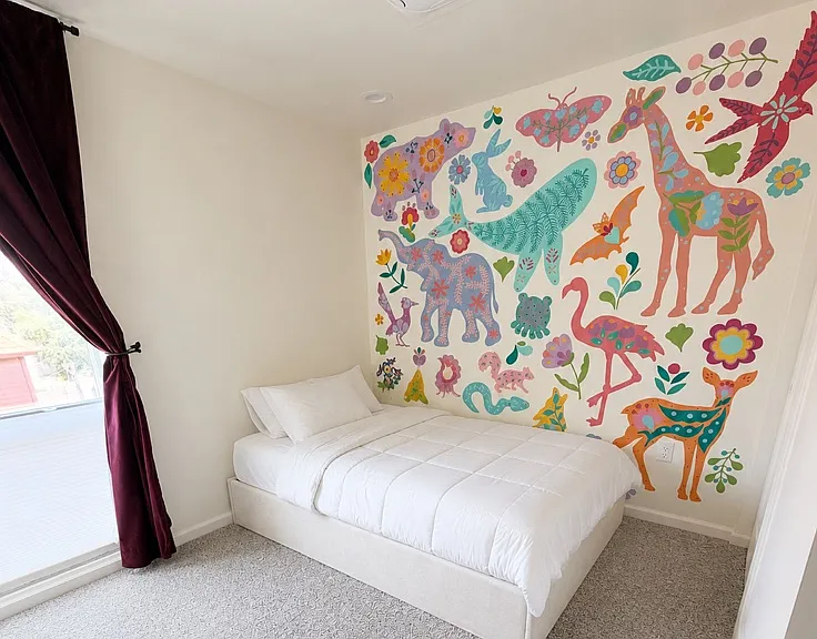 Second Bedroom. Mural was painted for owner's child. Removal considered for long-term tenants.