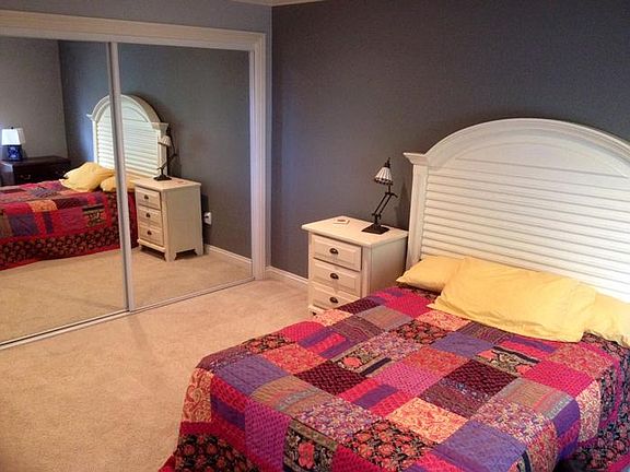 Huge well-lit bedroom with large built-in closet