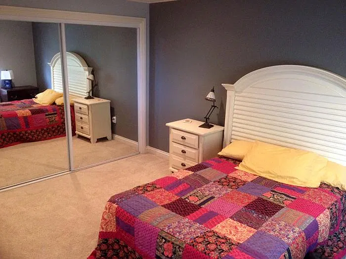 Huge well-lit bedroom with large built-in closet