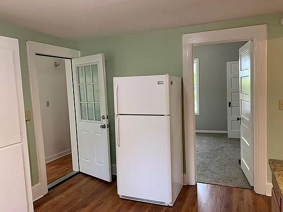 Entry way on left and bedroom #1 on right