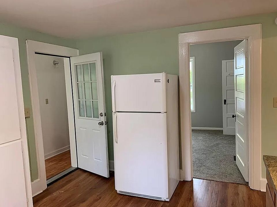 Entry way on left and bedroom #1 on right