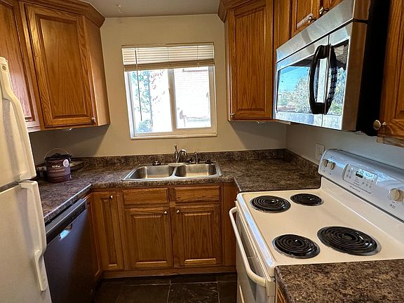 Nice kitchen with all appliances; refrigerator, dishwasher, over/stove, microwave, garbage disposal.