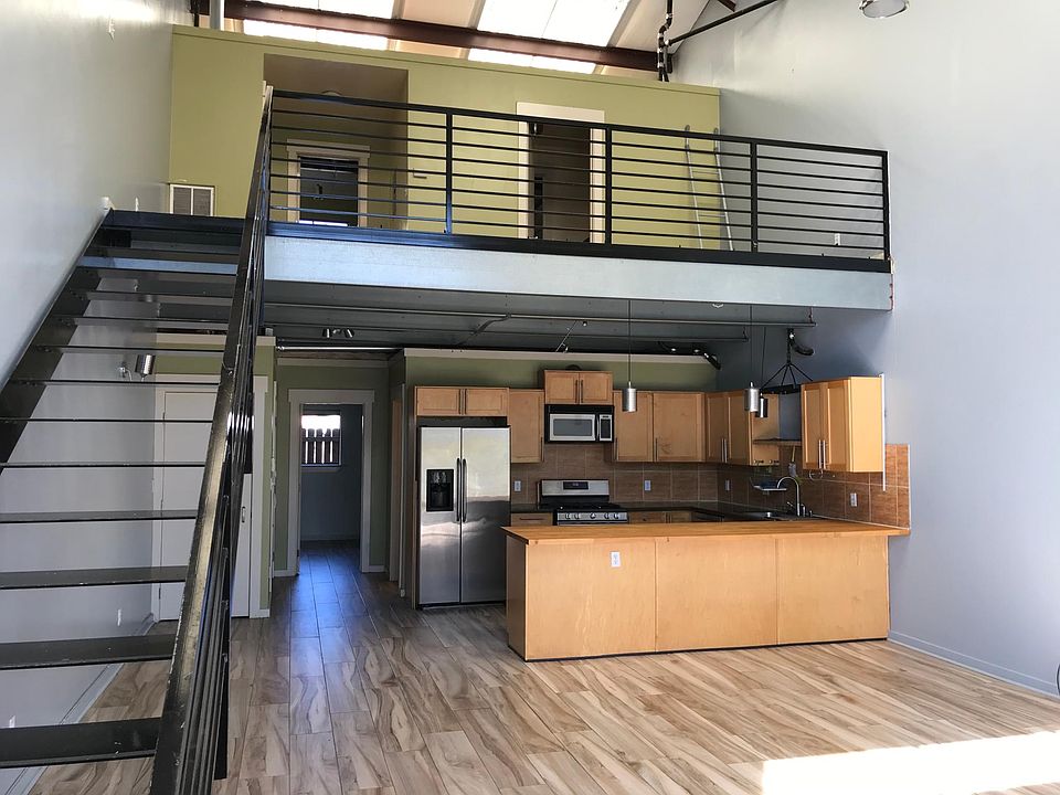 Living room, Kitchen, Downstairs bedroom, stairs to loft area