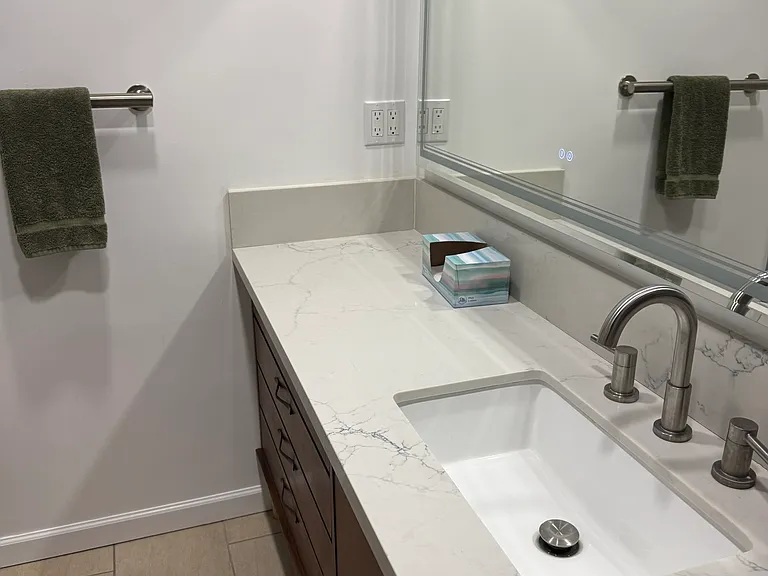 2nd bath. Custom vanity. Lighted/heated mirror.
