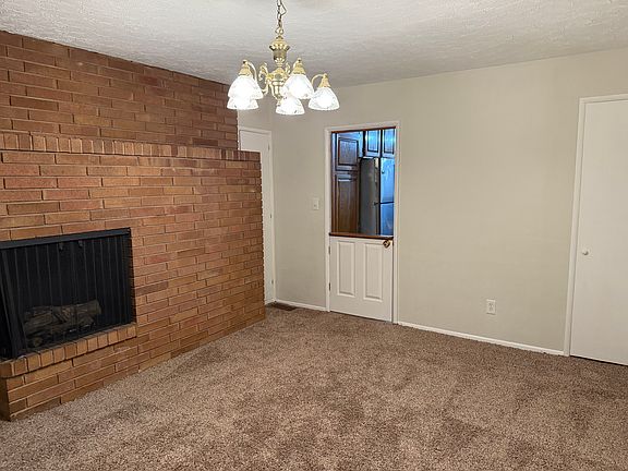 Formal Dining room with French doors to wrap around patio
