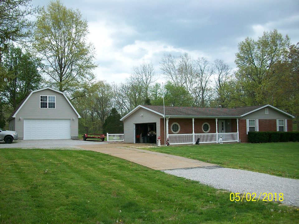 Sidewalk view of the house.