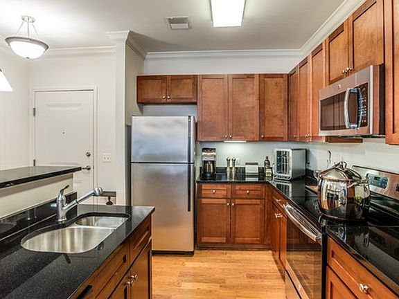 Granite Countertops in Luxury Kitchens with Maple Cabinetry