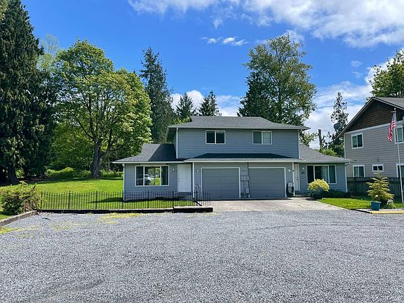 Attached garage, ample parking, and peaceful Marysville setting