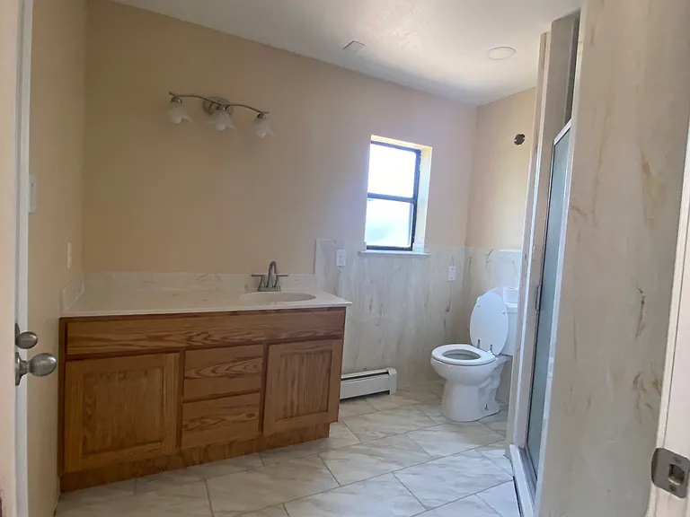 Master bathroom recently renovated with walk-in shower. (Pictured shown without mirror but is on order)