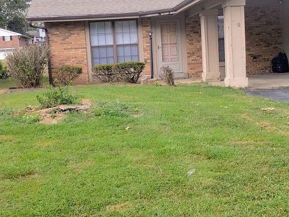 One car carport with storage
