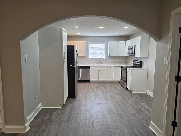 Looking from the living room area into the kitchen area