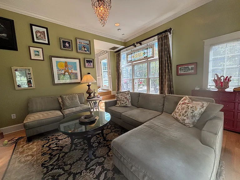 Family room with large screen television.