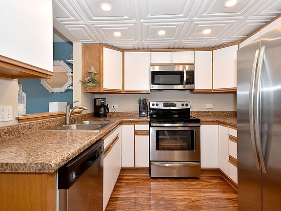 Kitchen has all stainless steel appliances