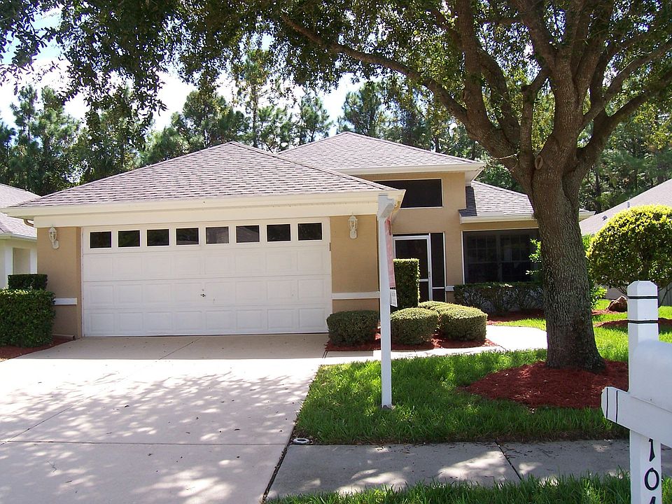 Front of house with full landscaping