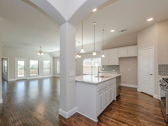 Open floor of the kitchen and living area.