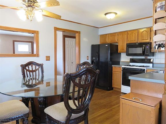 Cook up your next feast in this elegant wrap around kitchen.  Find ample cupboards and counter space perfect for the Gourmet Chef.  Kitchen features Eating Area, Hard Wood Floors,  and all appliances are included.