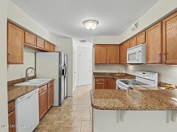 5th image of 527 Front Beach Dr APT 14