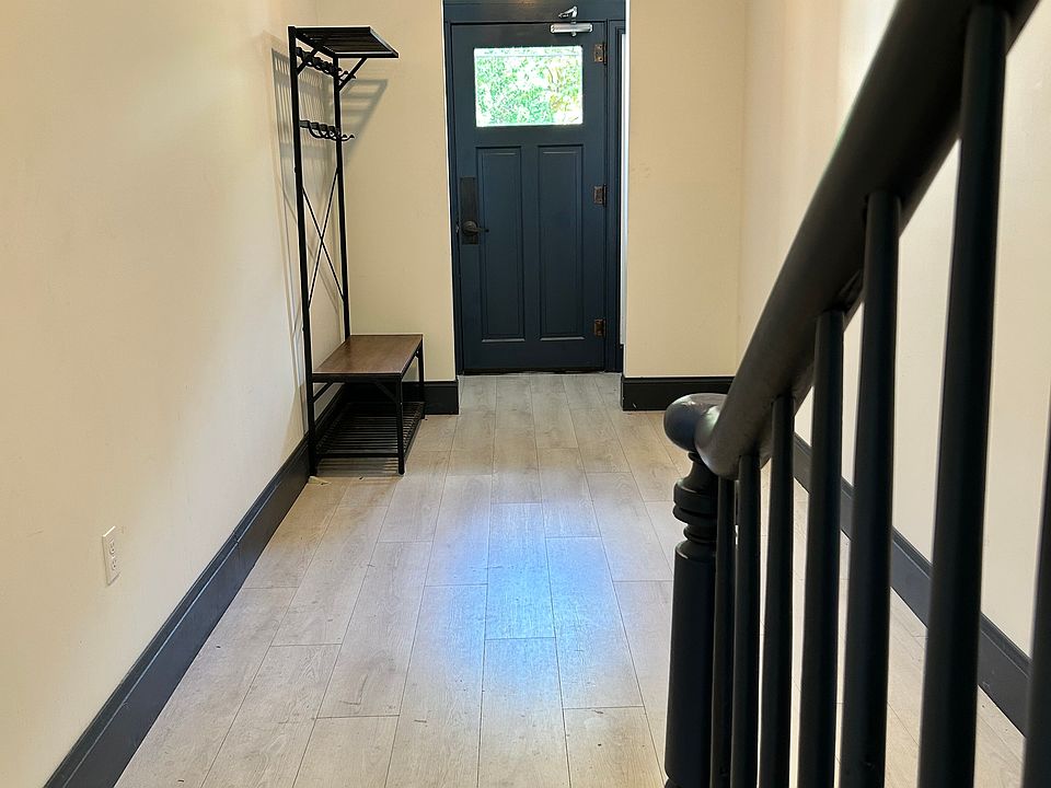 Front Hall and stair to Apt 4