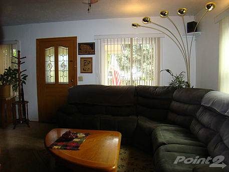 Living Room has 2 ceiling fans