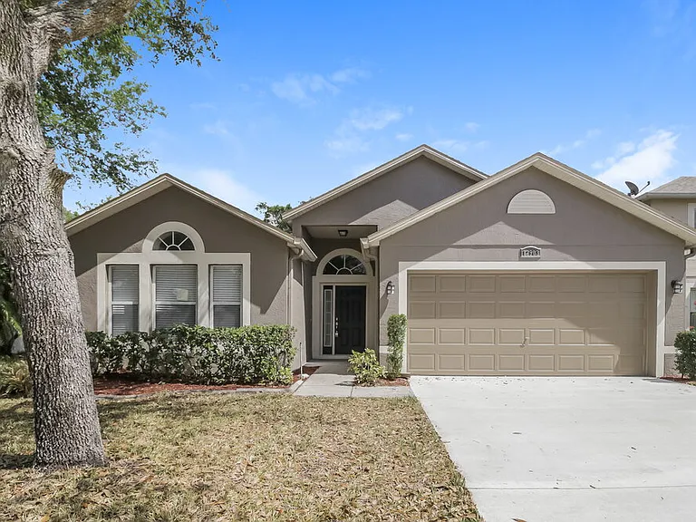 12503 Woodbury Cove Dr — Photo 1