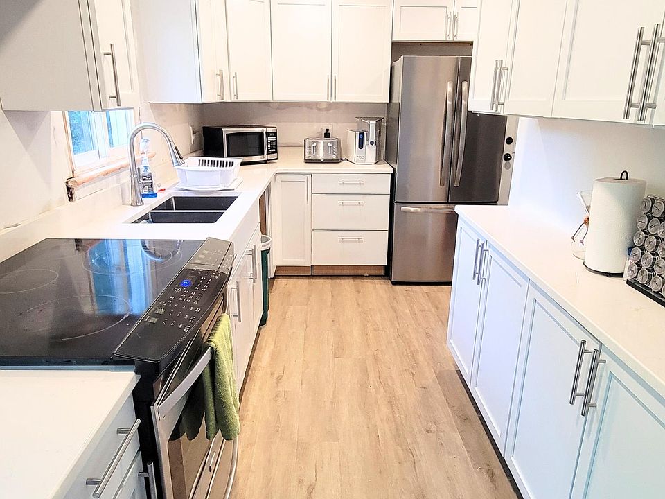 The kitchen is newly renovated with all-new stainless steel appliances.