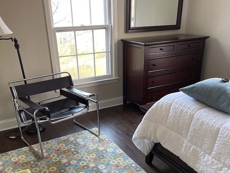 Pottery barn double bed, night stand and large dresser. 
Two closets. One has second floor laundry shoot to basement laundry