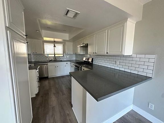 Kitchen with stove/oven and dishwasher