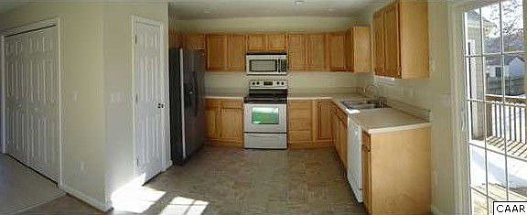 Panoramic of kitchen and laundry