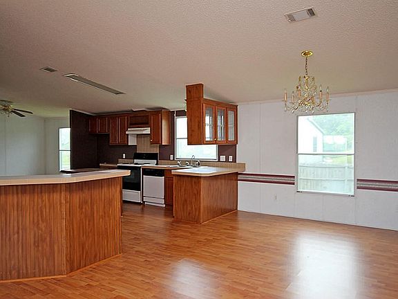 Formal dining room connects to kitchen for a functional feel!