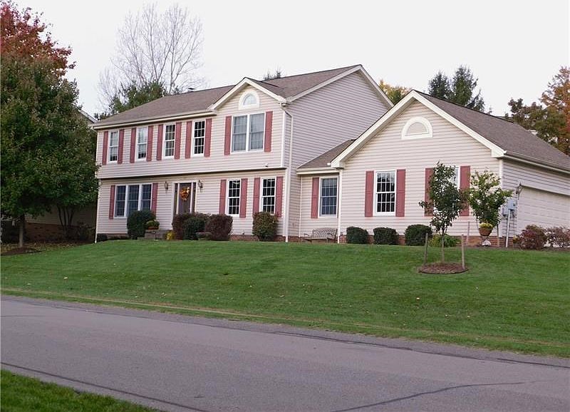Two story home with attached 2 car garage