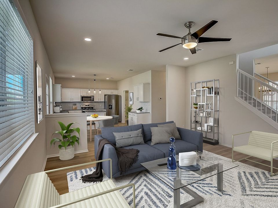 open concept living dining and kitchen