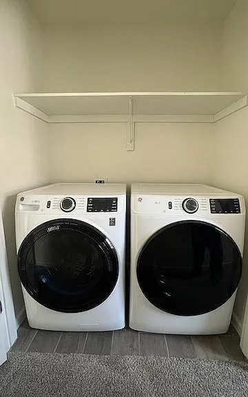 In unit washer dryer with custom shelf