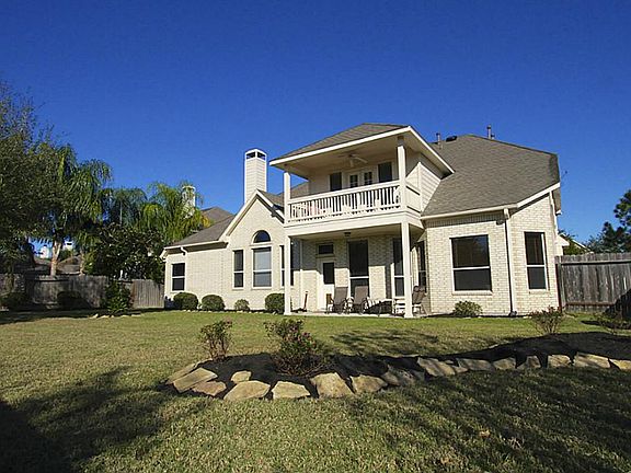 View of your backyard and second story decking.