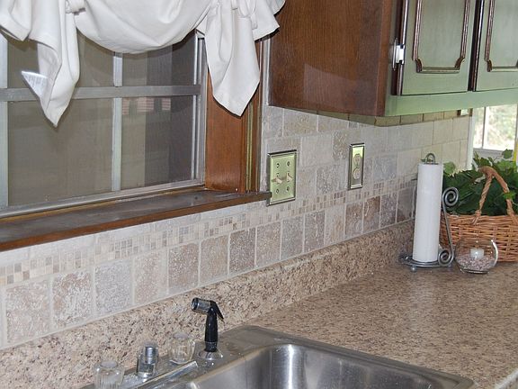 tumbled travertine marble backsplash