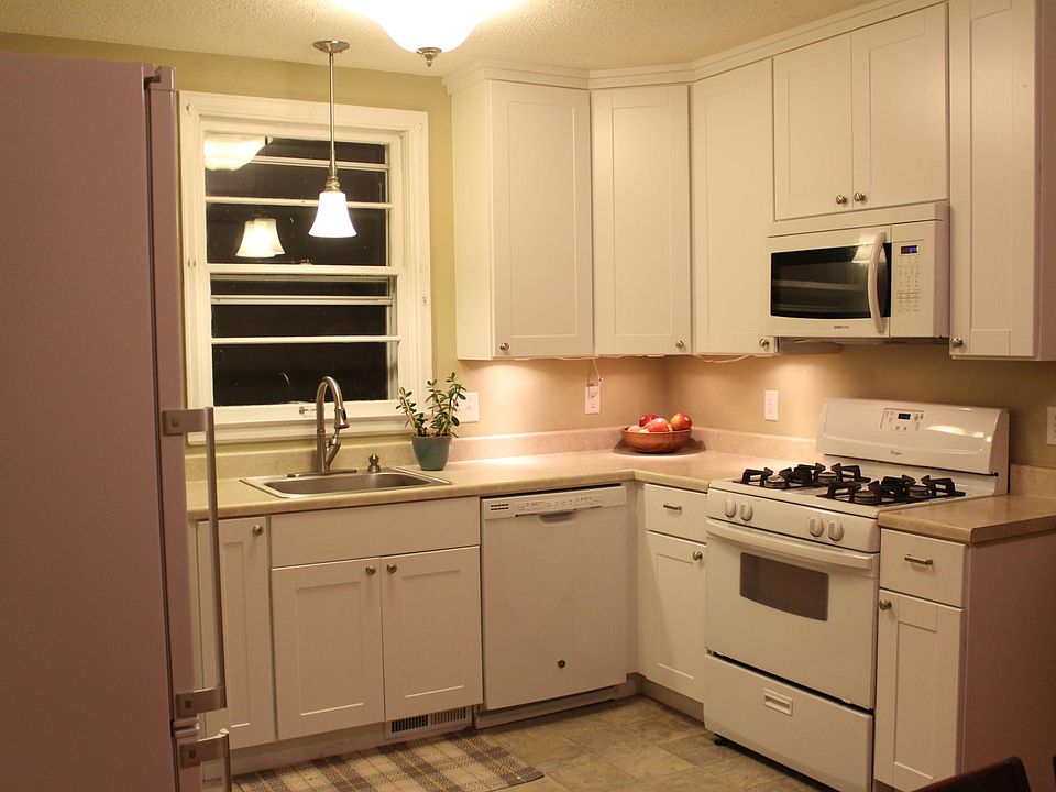 Kitchen updated in 2013 with dishwasher, microwave, updated gas stove, and garbage disposal