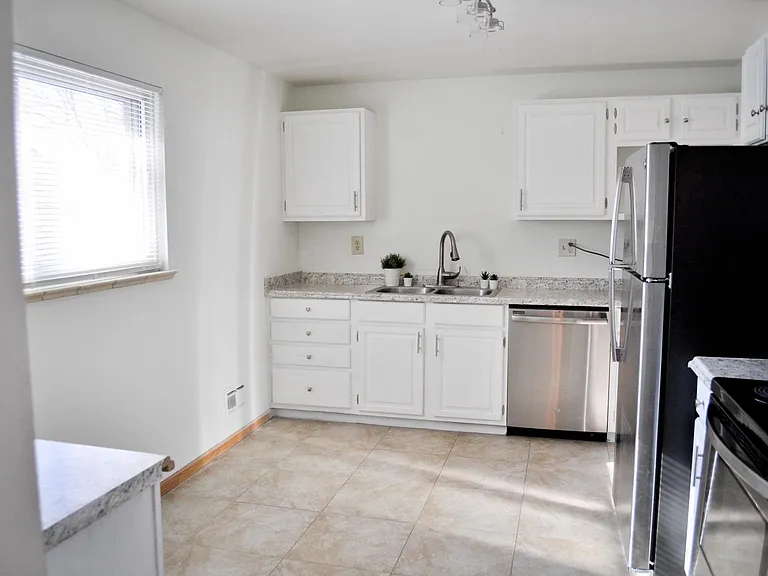 12460 E 31st Ave — Photo 1