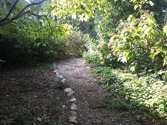 Path from driveway on Vance around to front of house