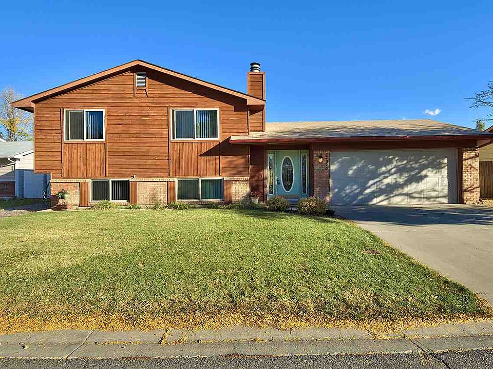 This large Orchard Mesa home boasts recent renovations and offers 4 bedroom and