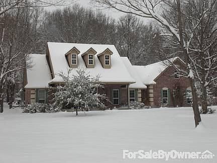 Front view of home in the winter. Snow!!