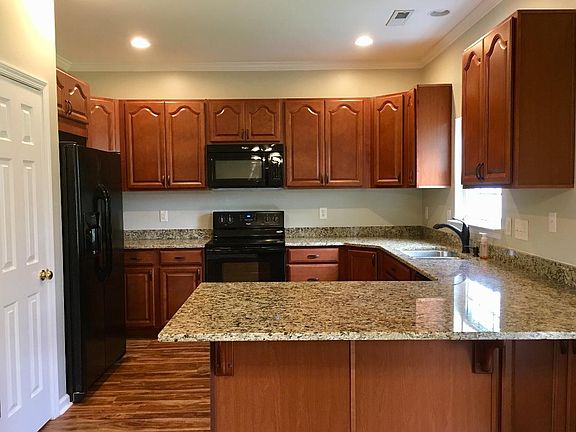 I dare ya to try and fill all these cabinets. No expense was spared on this completely renovated kitchen with 2 year old appliances, cabinets, counter tops and flooring.