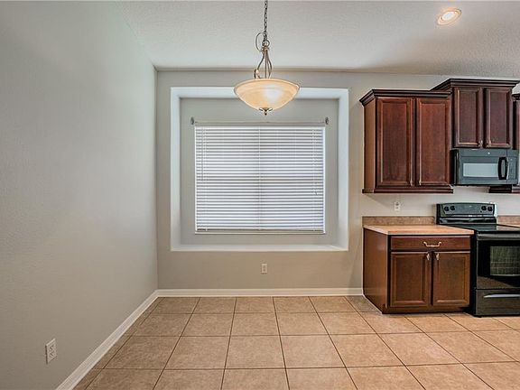 5th image of 8632 Sandy Plains Dr