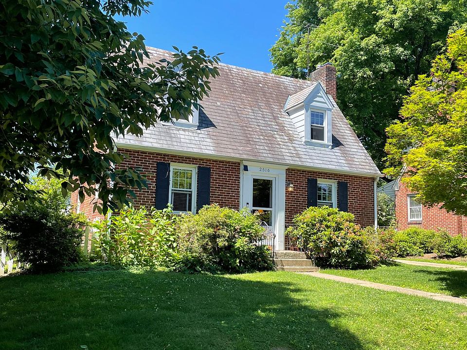 CLASSIC BRICK CAPE COD WITH MAIN LEVEL ADDITION