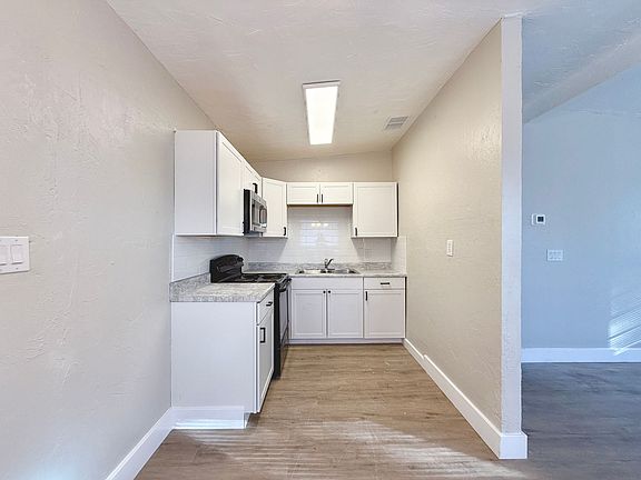 2nd image of 1012 26th St E #A