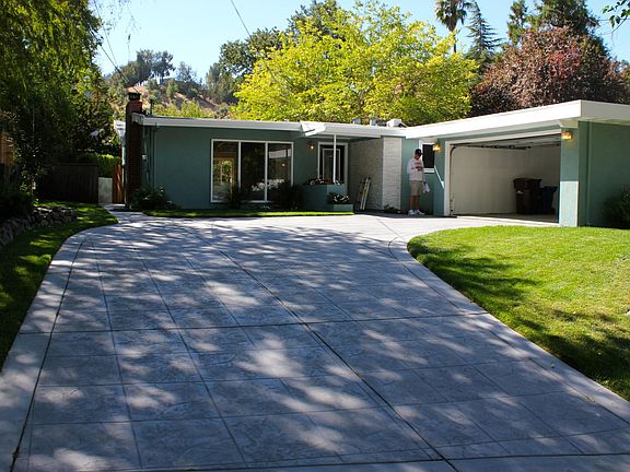 Front of the house and 2 -car detached garage